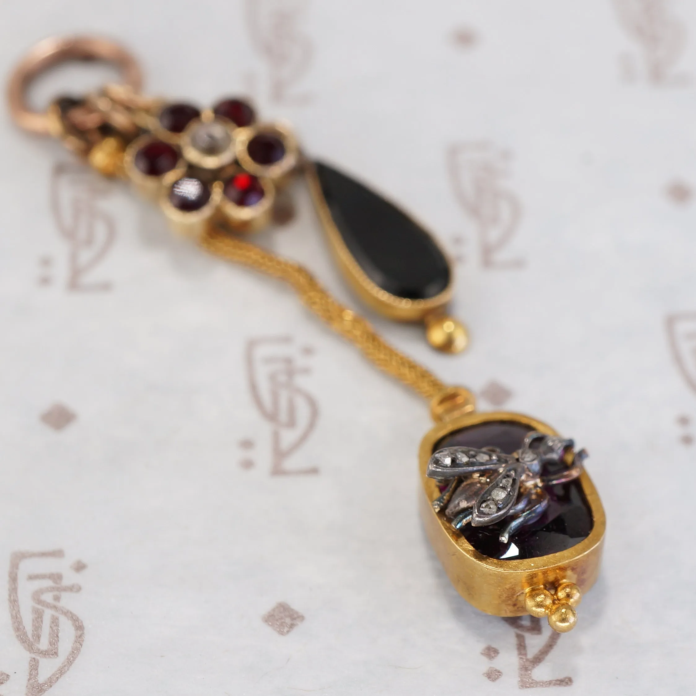 A Flower, a Fly & a Raindrop Dangle by Ancient Influences