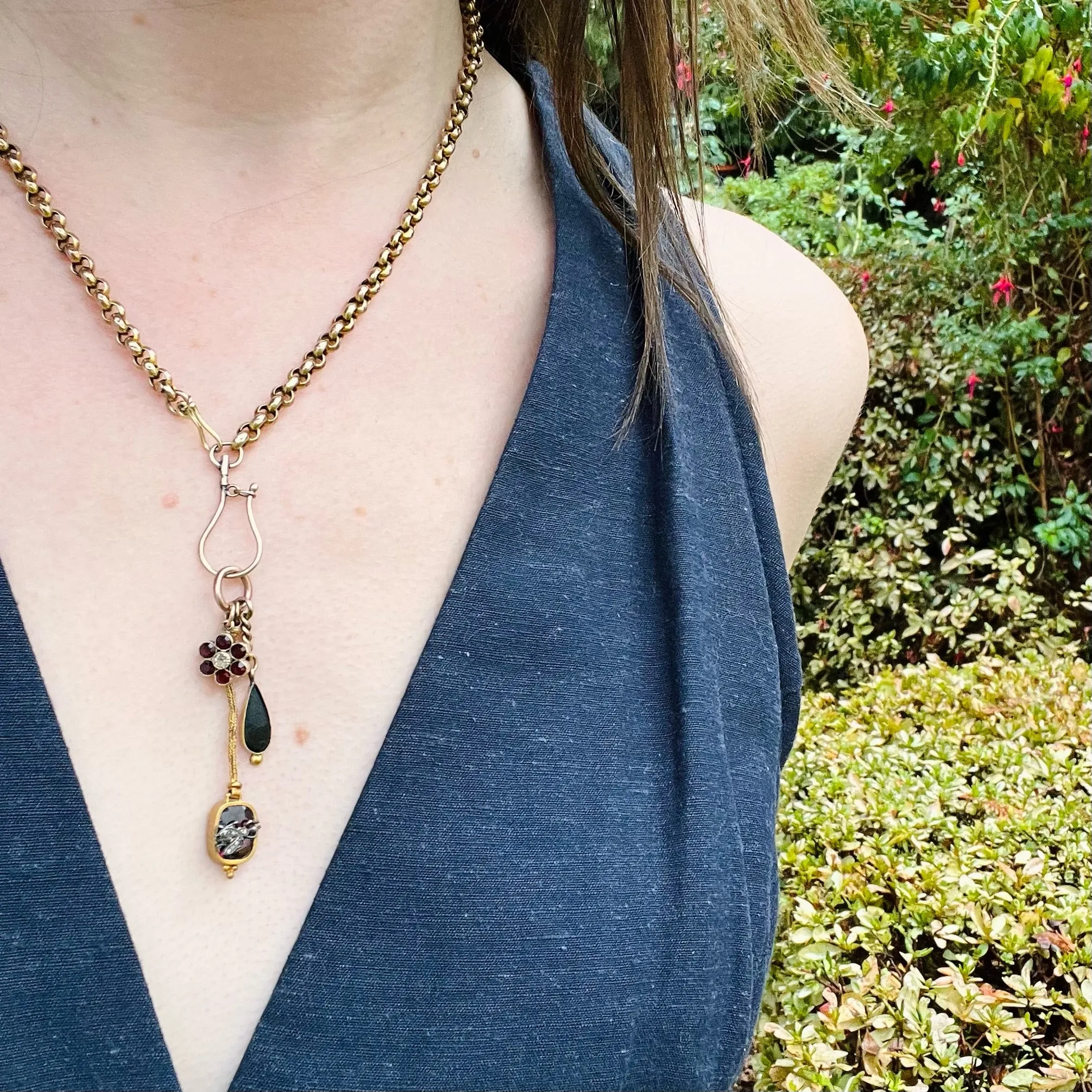 A Flower, a Fly & a Raindrop Dangle by Ancient Influences