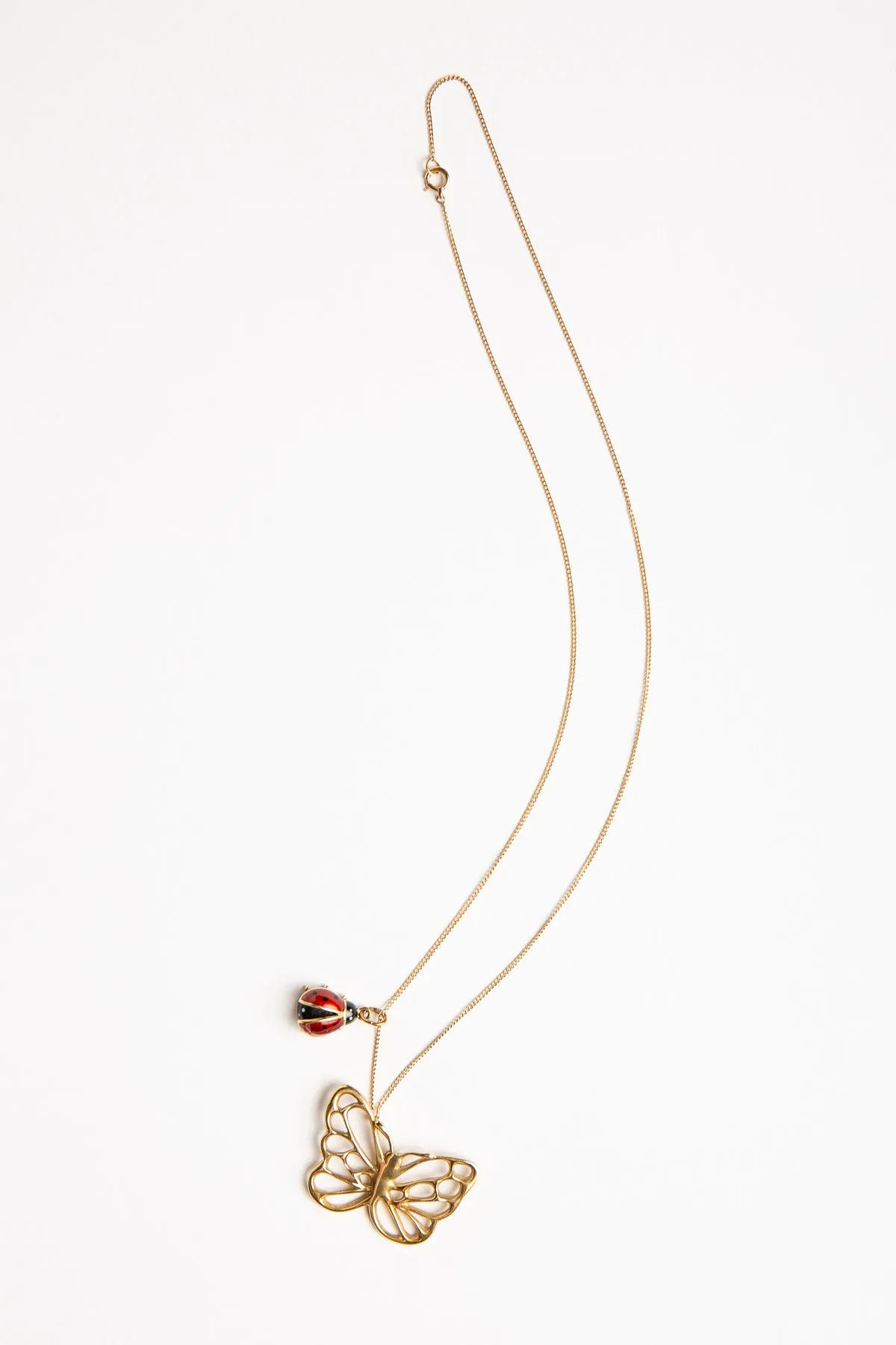 ANGELA CUMMINGS FOR TIFFANY & CO. | VINTAGE GOLD BUTTERFLY PENDANT WITH LADYBUG CHARM & CHAIN