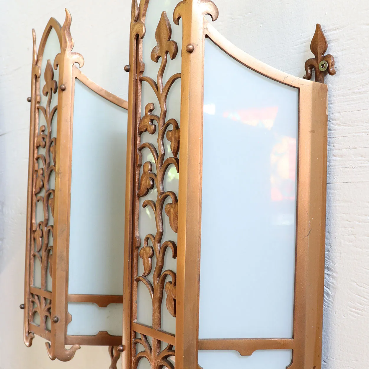 Pair of American Albert Sechrist Bronze and Flashed Glass One-Light Wall Sconces