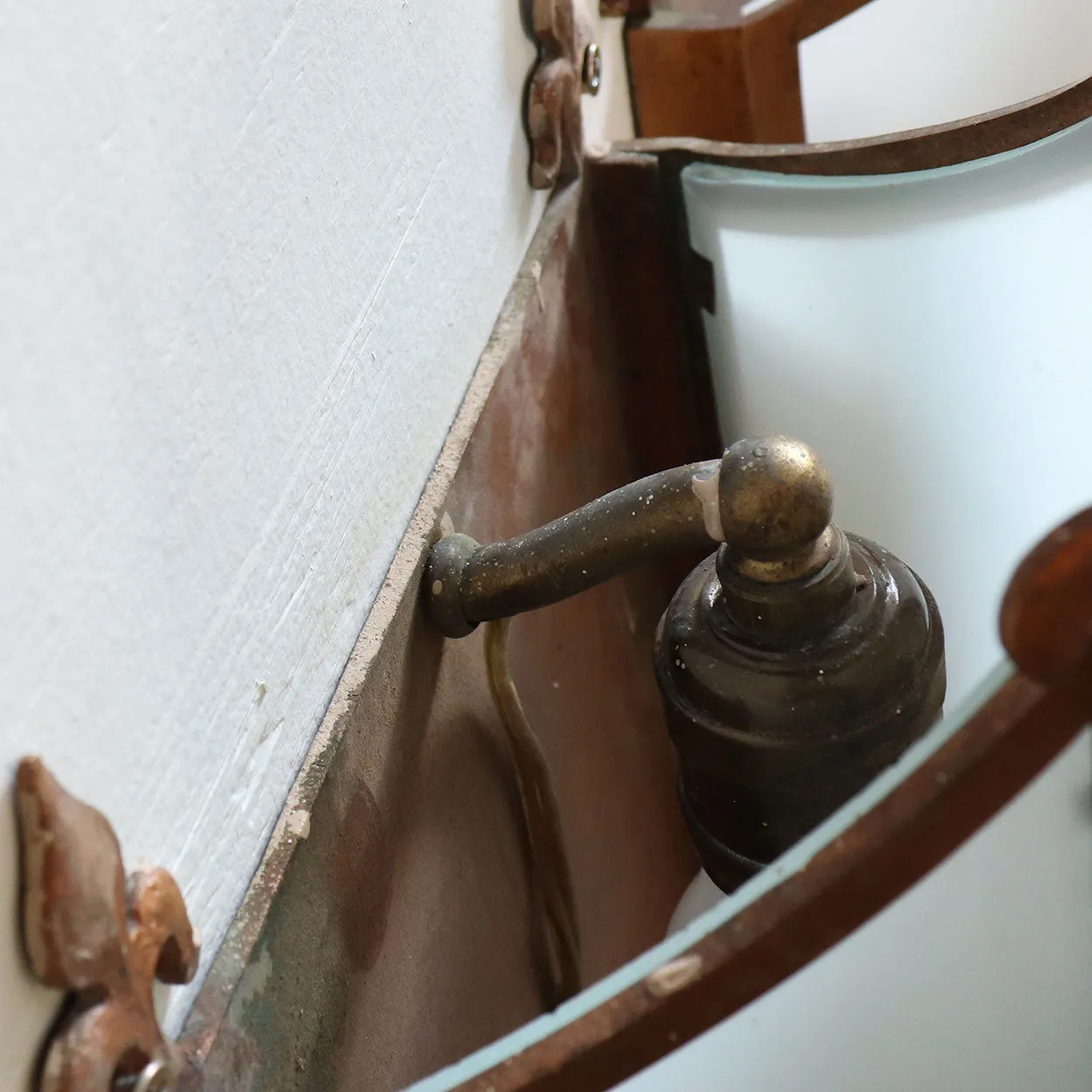 Pair of American Albert Sechrist Bronze and Flashed Glass One-Light Wall Sconces