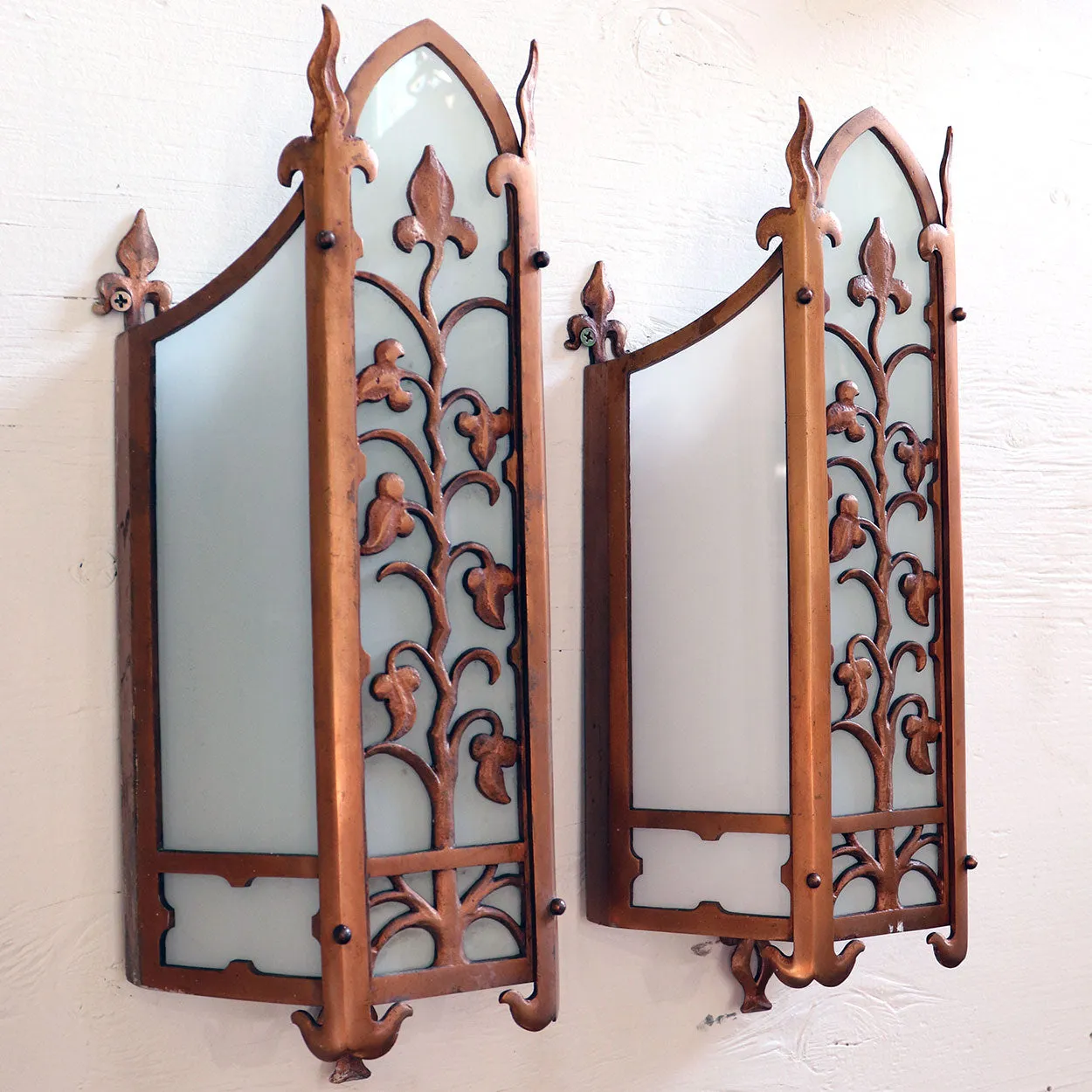 Pair of American Albert Sechrist Bronze and Flashed Glass One-Light Wall Sconces