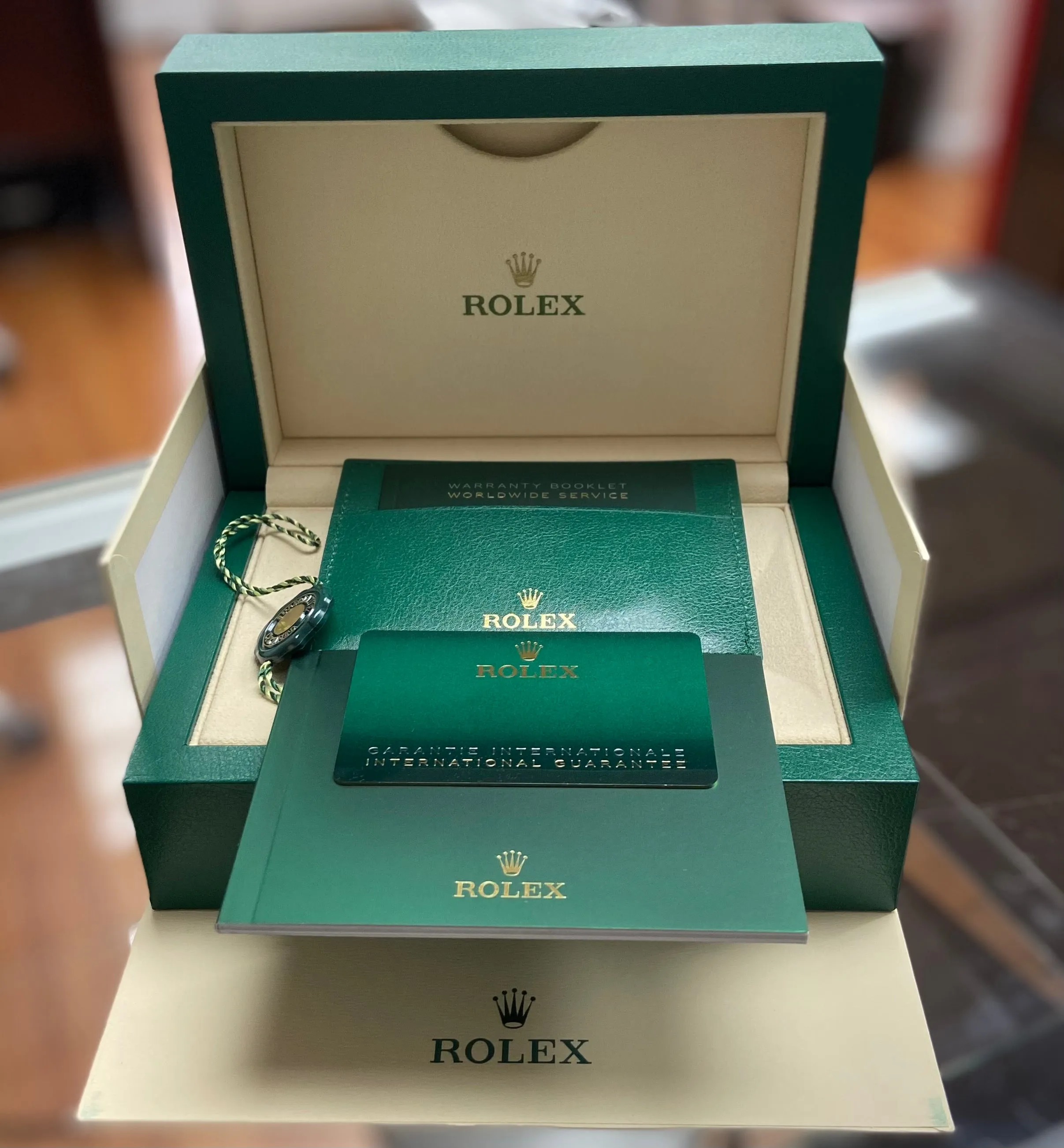 Rolex Day-Date 40mm Rose Gold Olive Green Roman Dial Fluted Bezel 228235