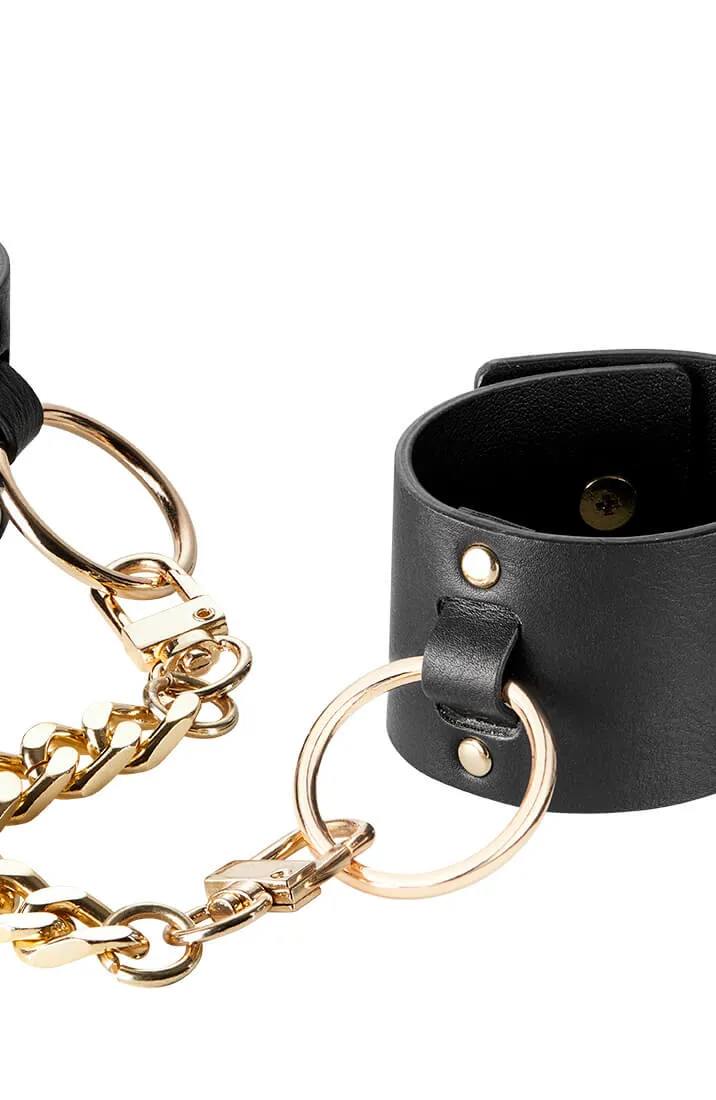 Wide faux leather cuffs with chain
